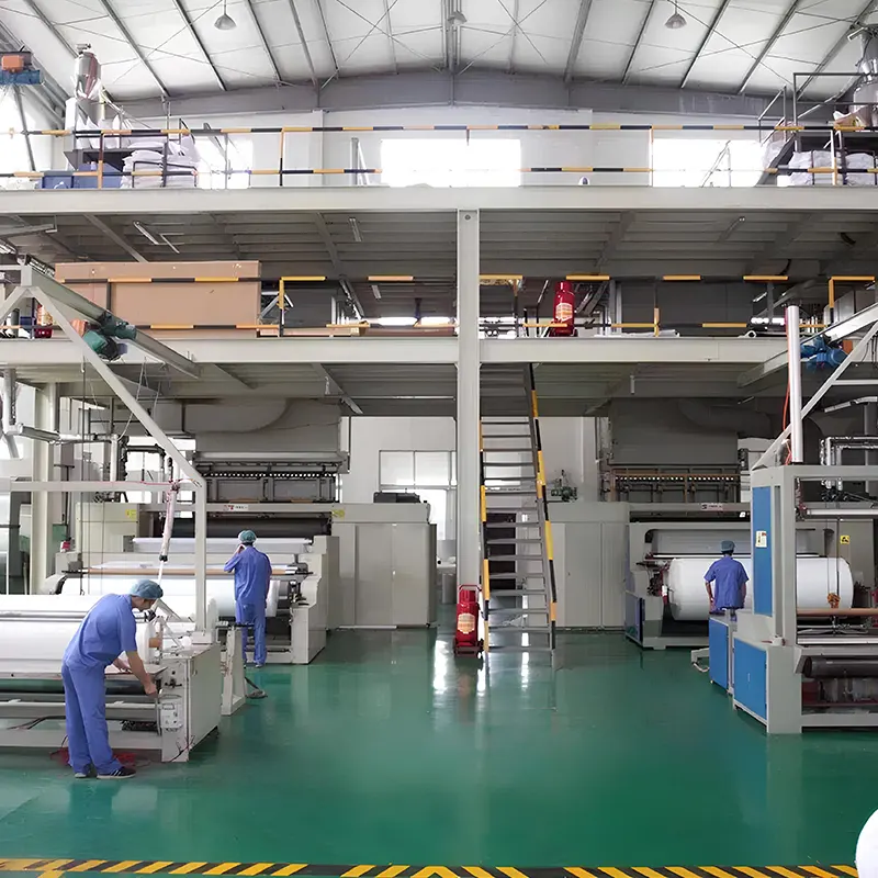 Technicians Supervise The Production Of Nonwoven Fabric