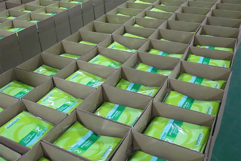 A Large Number Of Tablecloths Are Packed Into Cartons