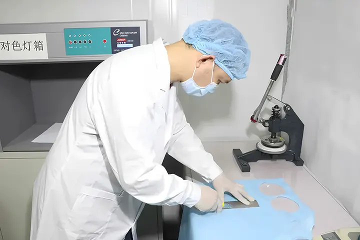 Take Samples Of The Test Non-woven Fabric