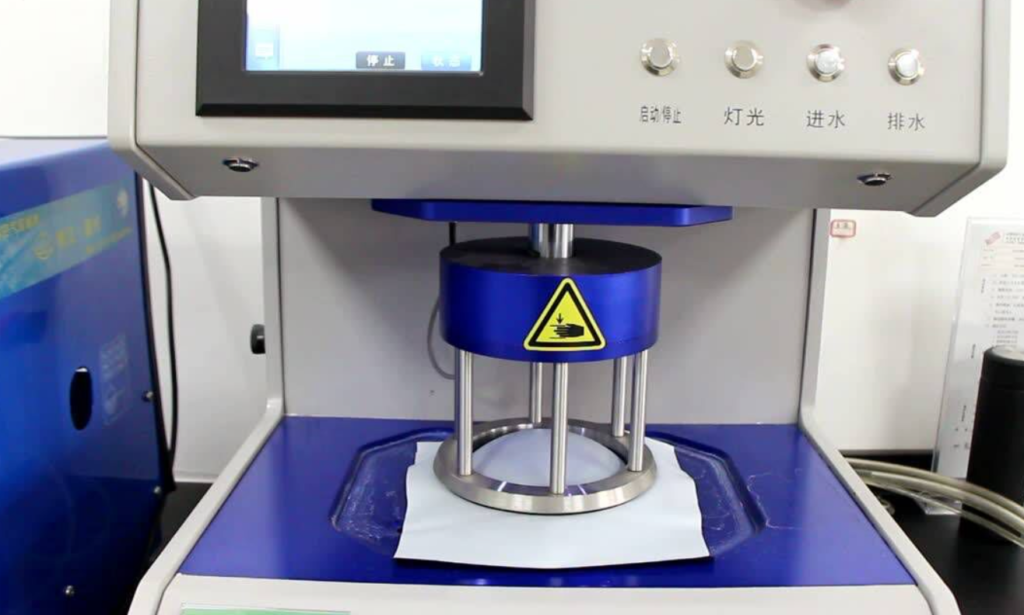 Hydrostatic head tester with water column pressing on nonwoven fabric sample