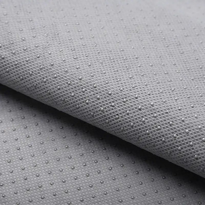 Gray dot anti-slip PET spunbond non-woven fabric, drop glue anti-slip finishing for furniture and shoe material skid resistant mat