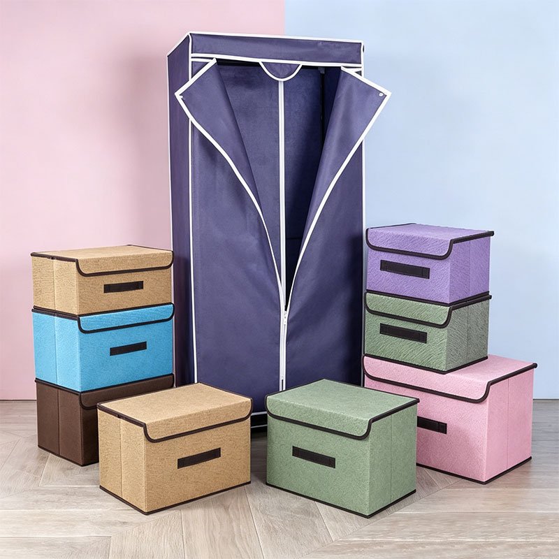 Freestanding fabric wardrobe and multi-color foldable storage boxes made of PET spunbond nonwoven fabric, showing household storage application of nonwoven material