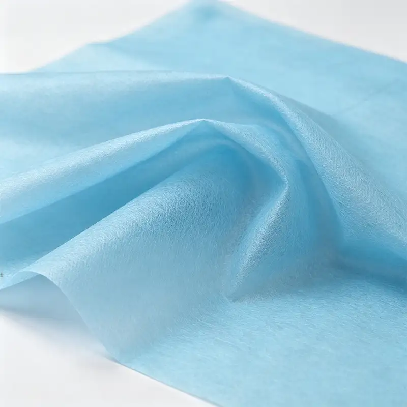 Light blue soft dot mesh PP nonwoven fabric, raw material for disposable spa massage bed sheets, skin-friendly beauty salon nonwoven fabric by Takewind