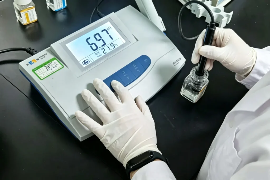 Lab technician testing mask grade PP spunbond nonwoven, strict batch to batch quality audit at Takewind laboratory