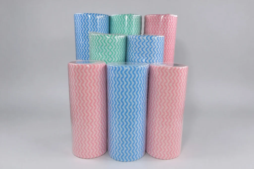 Stacked Takewind nonwoven cleaning cloth rolls, custom size non-woven wipe rolls with different length and width options