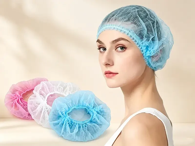 Takewind disposable nonwoven bouffant hair cap in blue pink white colors for beauty salon