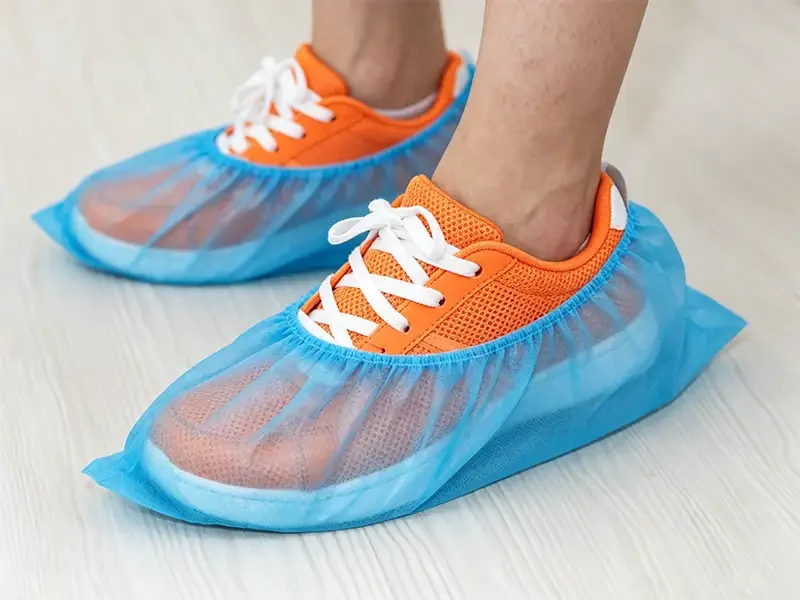 Takewind blue disposable nonwoven shoe covers for indoor beauty salon hygiene